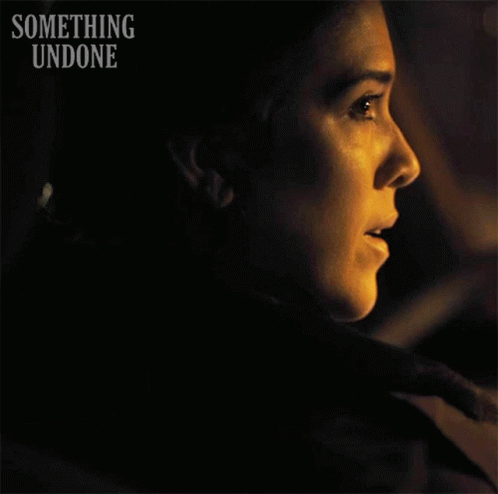A Movie Poster For Something Undone Shows A Woman Talking To Someone GIF