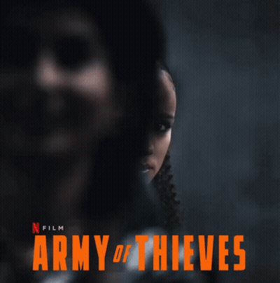 A Movie Poster For The Army Of Thieves Shows A Woman GIF