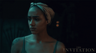A Movie Poster For The Invitation Features A Woman Wearing A Scarf Around Her Head GIF