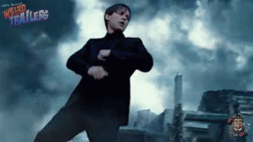 A Movie Poster For Weird Trailers Shows A Man In A Black Suit Dancing GIF