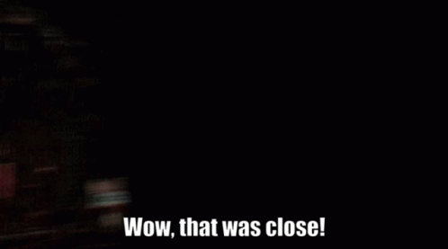 A Movie Theater With The Words Wow That Was Close On The Bottom GIF