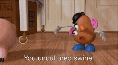A Mr Potato Head Says " You Uncultured Swine " In A Toy Story Scene GIF