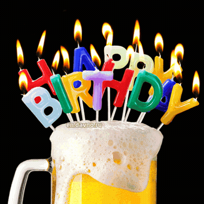 A Mug Of Beer With Birthday Candles On Top GIF
