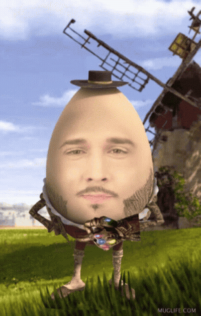 A Muglife.com Image Of A Man 'S Face In An Egg GIF