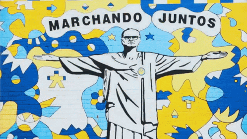 A Mural Of Jesus With The Words Marchando Juntos Above GIF