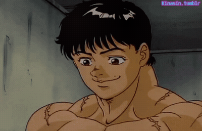 a muscular man is drinking a bottle of coca cola from his mouth .