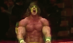 A Muscular Wrestler Is Sitting In A Ring With His Mouth Open And His Eyes Closed . GIF