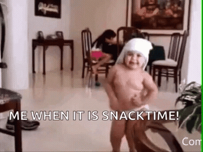 A Naked Baby Is Dancing In A Living Room With The Words `` Me When It Is Snacktime '' . GIF
