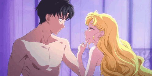 A Naked Man And A Naked Woman Are Standing Next To Each Other . GIF