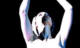 A Naked Person With Their Arms Outstretched And Their Mouth Open GIF