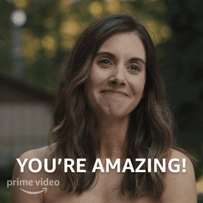 A Naked Woman Is Smiling With The Words You 'Re Amazing On The Bottom GIF