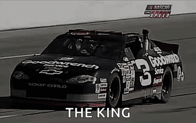 A Nascar Race Car Is Driving Down A Track And Says The King GIF