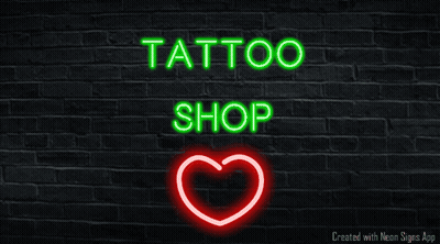 A Neon Sign For A Tattoo Shop With A Heart GIF