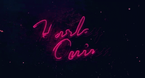 A Neon Sign For Harley Quinn Is Lit Up In Pink GIF