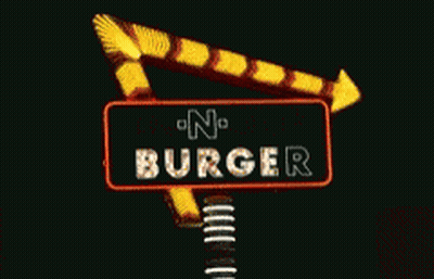 A Neon Sign For In-N-Out Burger Is Lit Up GIF