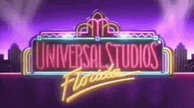 A Neon Sign For Universal Studios Florida With A Purple Background GIF
