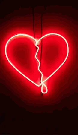 A Neon Sign Of A Broken Heart On A Red Wall Sticker