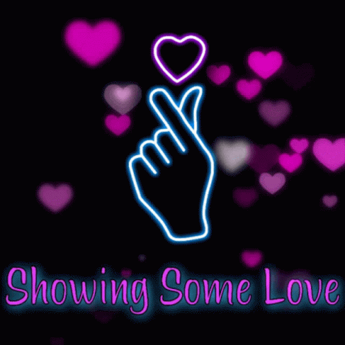 A Neon Sign Of A Hand Making A Heart With Its Fingers GIF
