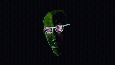 A Neon Sign Of A Man Wearing Sunglasses On A Dark Background GIF