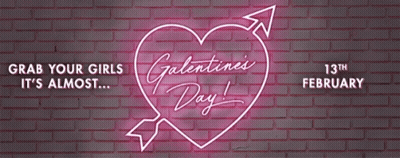 a neon sign on a brick wall says valentine 's day