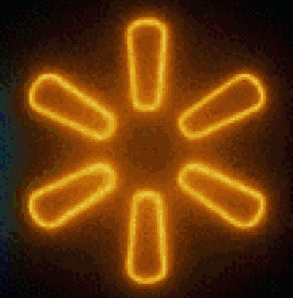 A Neon Sign That Looks Like A Star With A Dark Background GIF