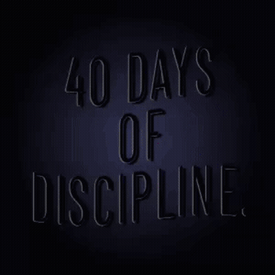 A Neon Sign That Says 40 Days Of Discipline On A Dark Background . GIF