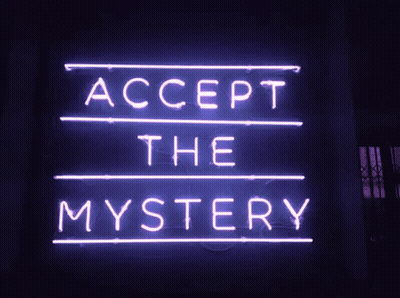 A Neon Sign That Says Accept The Mystery Is Lit Up GIF