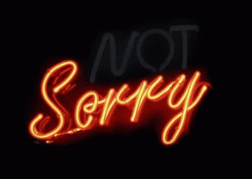 A Neon Sign That Says Not Sorry Is Lit Up GIF