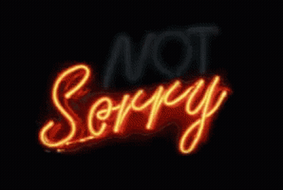 A Neon Sign That Says ' Not Sorry ' On It GIF