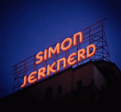 A Neon Sign That Says Simon Jerknerd Is Lit Up At Night GIF