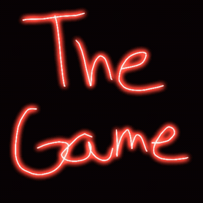 A Neon Sign That Says The Game In Red GIF