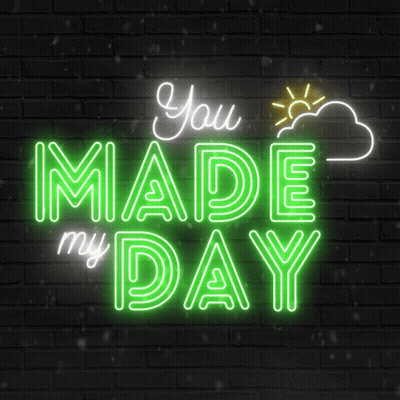 A Neon Sign That Says " You Made My Day " On A Brick Wall GIF