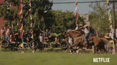 A Netflix Ad Shows A Cowboy Riding A Horse In A Field GIF
