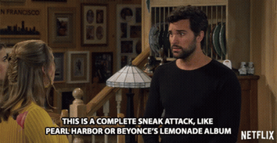A Netflix Ad Shows A Man And A Woman GIF