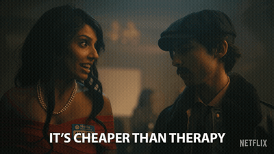 A Netflix Ad Shows A Man And A Woman Talking To Each Other GIF
