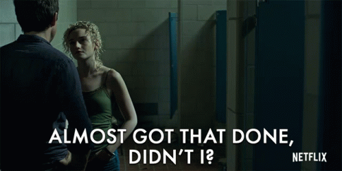 A Netflix Ad Shows A Man And Woman Standing In A Bathroom GIF