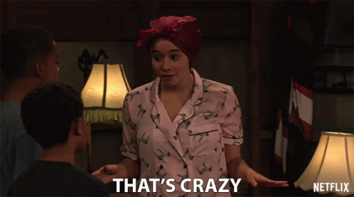 A Netflix Ad Shows A Woman In Pajamas Talking To Two Boys GIF