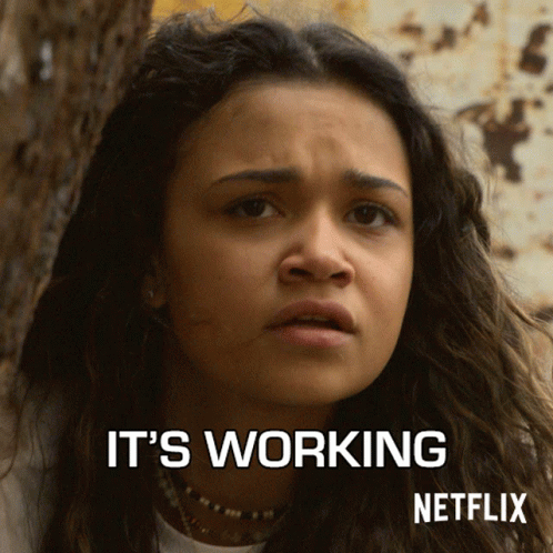 A Netflix Ad Shows A Woman Making A Face And The Words It 'S Working GIF