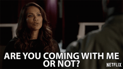 A Netflix Ad Shows A Woman Talking To A Man GIF