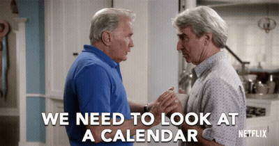 A Netflix Ad Shows Two Men Looking At A Calendar GIF