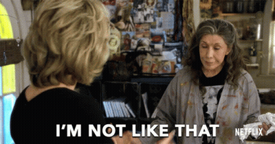 A Netflix Ad Shows Two Women Talking And One Of Them Says " I 'M Not Like That " GIF