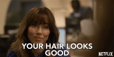 A Netflix Ad With A Woman And The Words Your Hair Looks Good GIF