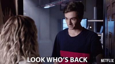 A Netflix Advertisement Shows A Man And A Woman Looking At Each Other GIF