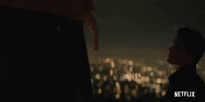 A Netflix Advertisement Shows A Man Holding A Key GIF