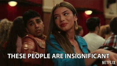 A Netflix Advertisement Shows A Woman And A Man And Says These People Are Insignificant GIF