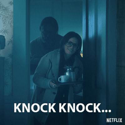 A Netflix Advertisement Shows A Woman Holding A Tray Of Coffee Cups GIF