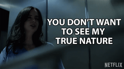 A Netflix Advertisement Shows A Woman In An Elevator And Says You Do N't Want To See My True Nature GIF
