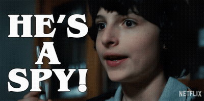 A Netflix Advertisement Shows A Young Boy Holding A Pen And The Words He 'S A Spy GIF