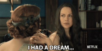 A Netflix Advertisement Shows Two Women Holding Hands And One Says I Had A Dream GIF