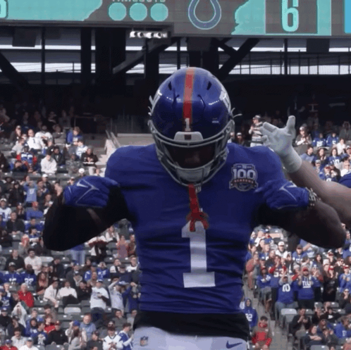 A New York Giants Football Player Wearing Number 1 GIF